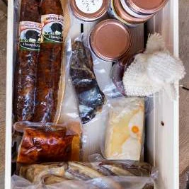 Grand feast crate with mangalica sausage, bacon, ham, smoked quail eggs and jam